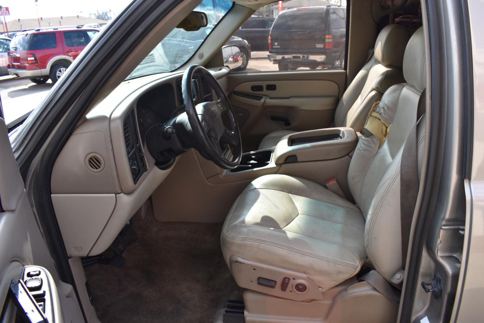 2003 Gold /Tan Chevrolet Suburban (1GNEC16Z23J) with an V8, 5.3.0L engine, 4 SPEED AUTOMATIC transmission, located at 5925 E. BELKNAP ST., HALTOM CITY, TX, 76117, (817) 834-4222, 32.803799, -97.259003 - Buying a 2003 Chevrolet Suburban can offer several benefits, including: Spaciousness: The Suburban is known for its ample interior space, making it great for large families, hauling cargo, or even converting into a camper. Towing Capacity: It's equipped with a robust engine and frame, allowing it - Photo#6